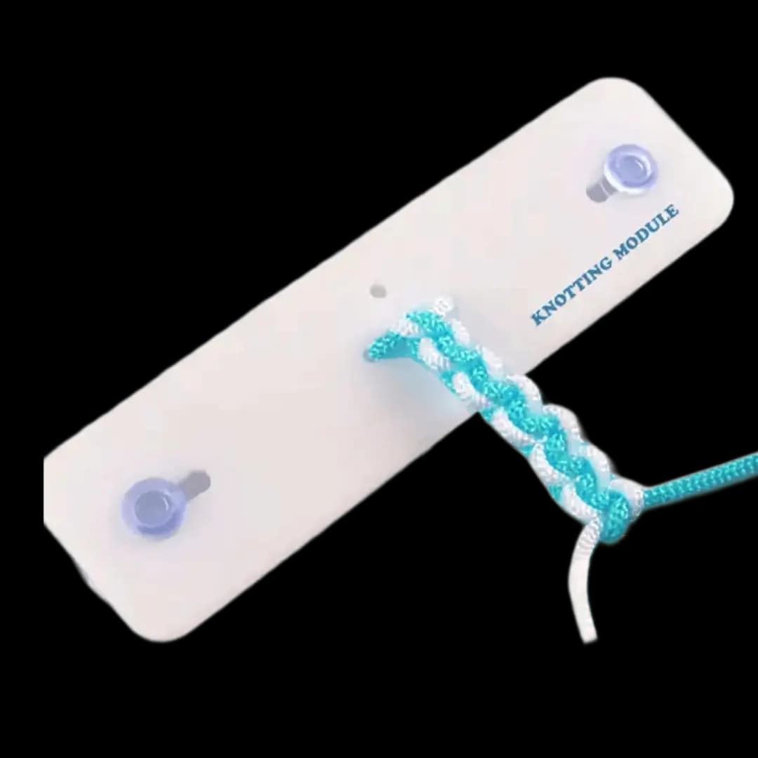 Knot-tying simulator with ropes showing training knots